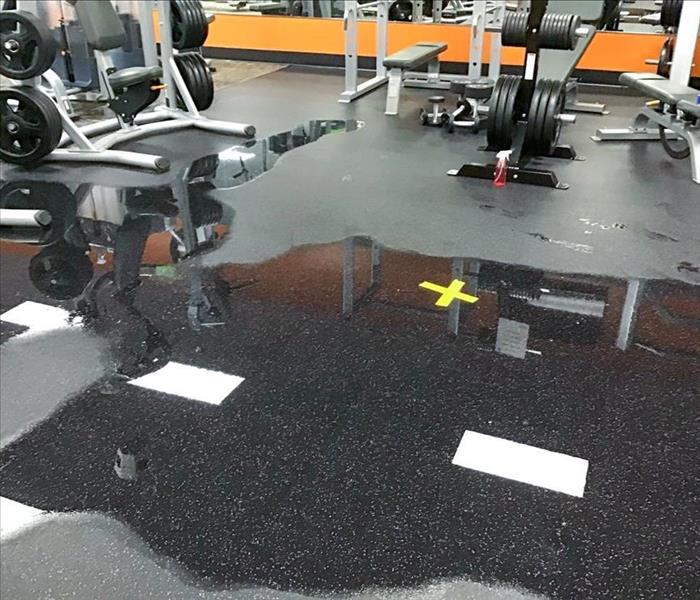 Water on the floor of a gym in Pasco, WA