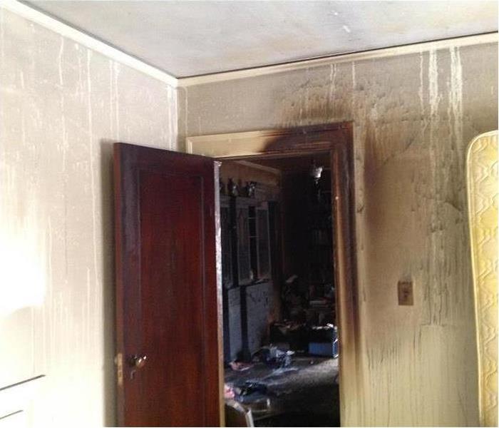 Walls inside a home covered in smoke and soot 